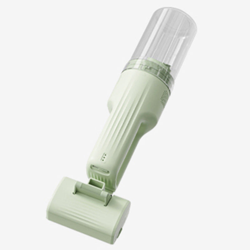 Green handheld 70W pet-hair vacuum groomer with brush-roller attachment
